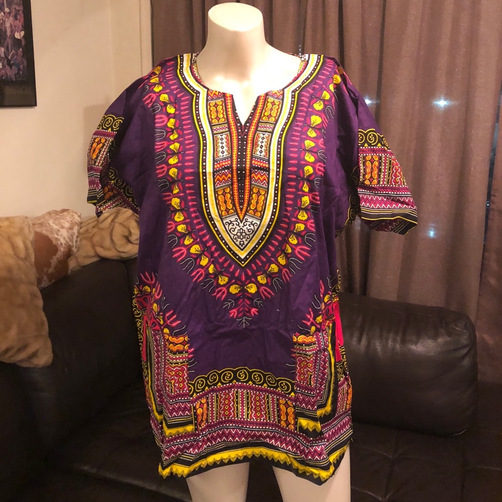 Beautiful Disheki with two front pockets. NWOT